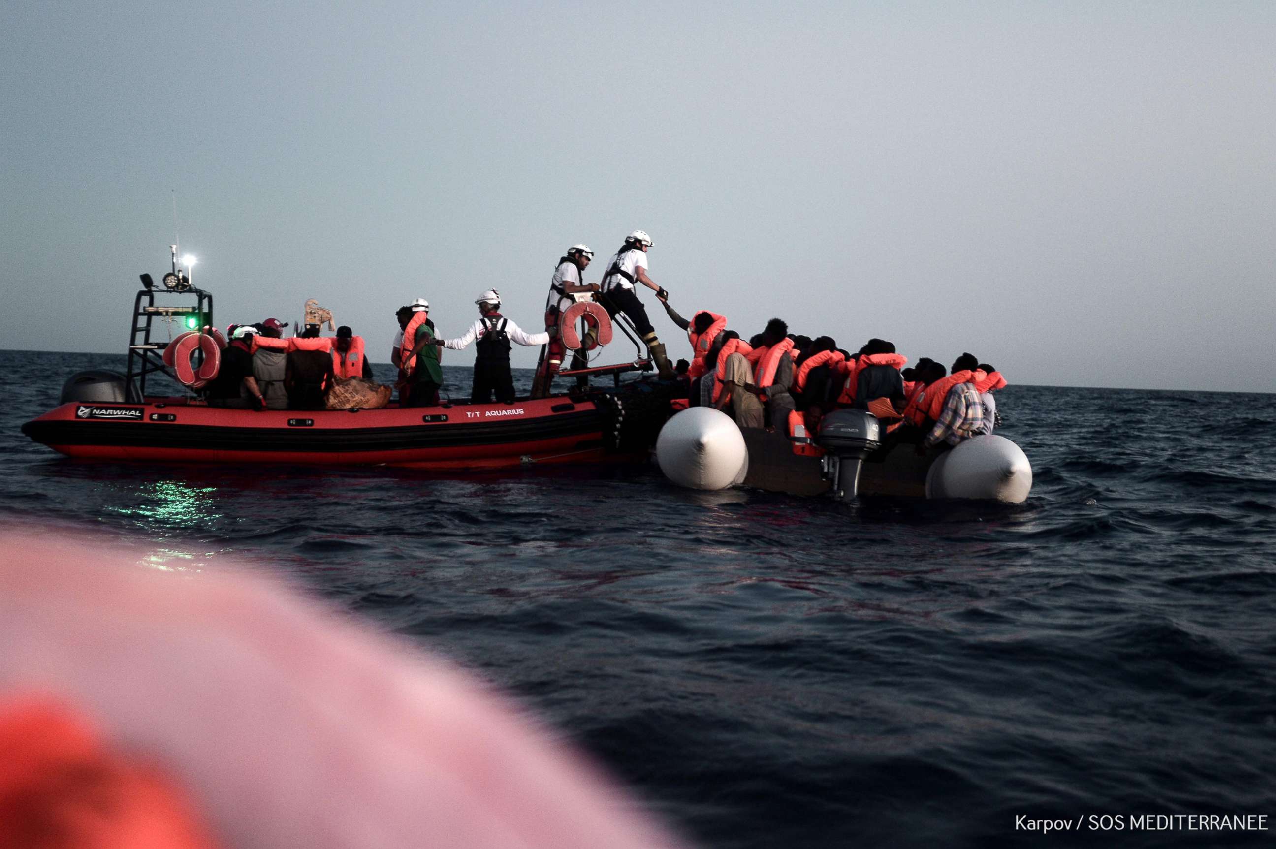 PHOTO: Migrants are rescued in the Mediterranean sea on June 9, 2018 in a picture released on June 11, 2018 by SOS Mediterranee, before boarding the French NGO's ship Aquarius.