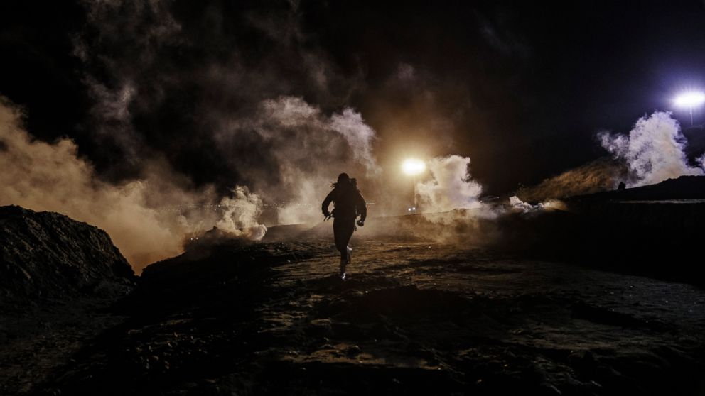 VIDEO: U.S. border authorities fired tear gas into Mexico on Monday night when group of roughly 150 migrants attempted to illegally cross the border to San Diego.