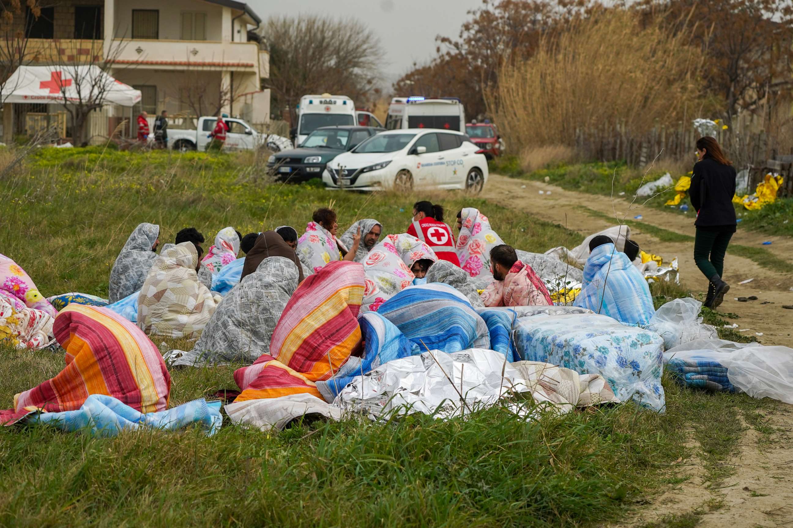 PHOTO: Some migrants who were saved from the shipwreck that occurred on Feb. 26, 2023, were rescued and helped and warmed by blankets in Steccato di Cutro, near Crotone, in Calabria, southern Italy.