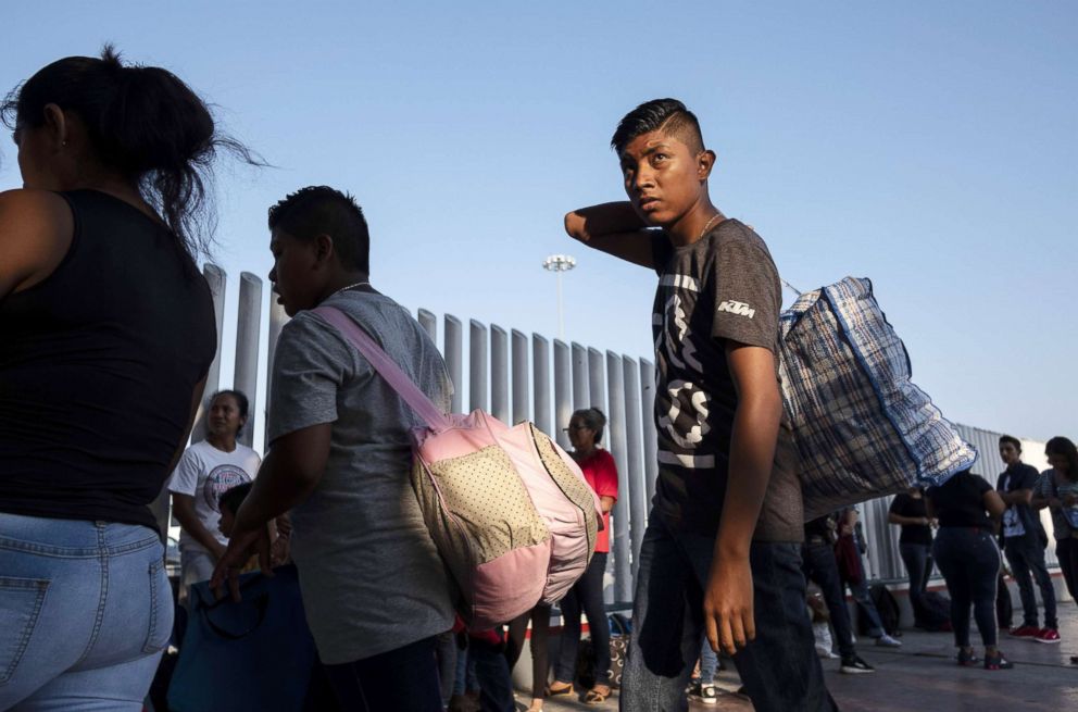 PHOTO: Asylum seekers gather at El Chaparral port of entry in Tijuana, Baja California state, Mexico on Aug. 10, 2018, as they look for an appointment to present their asylum request before the U.S. authorities.