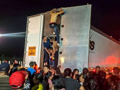 350 migrants found 'crowded and dehydrated' in trailer in Mexico, authorities say
