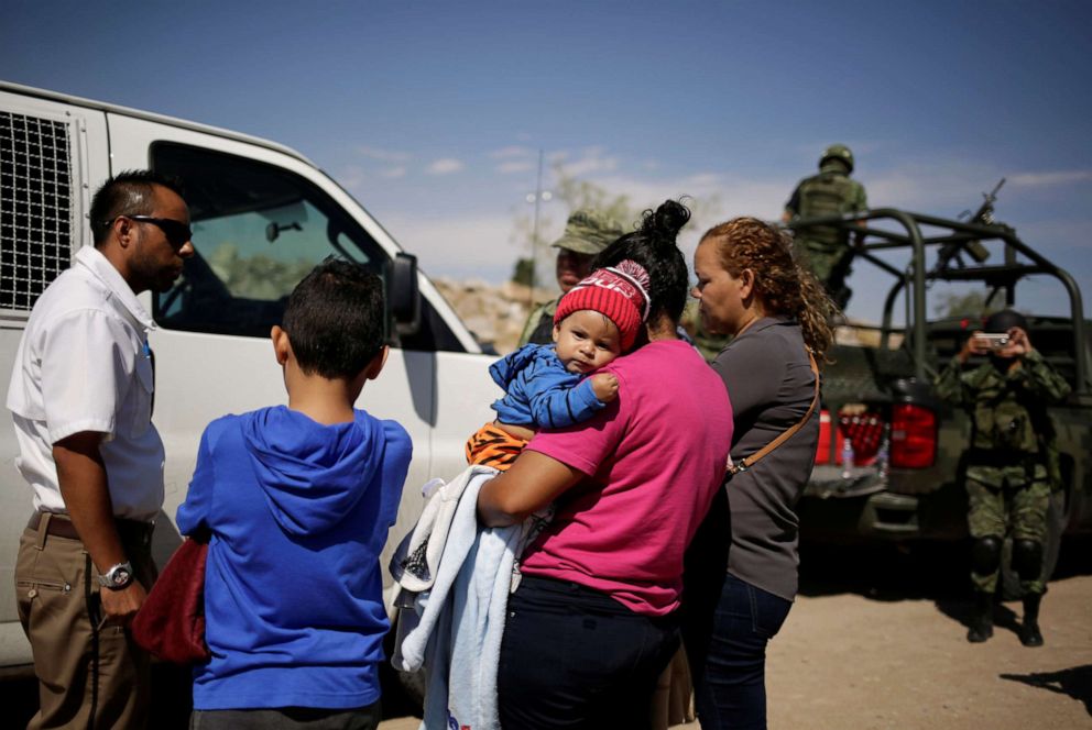 PHOTO: Honduran migrants are stopped by members of the Mexican National Guard in Anapra, on the outskirts of Ciudad Juarez, Mexico, June 28, 2019. 