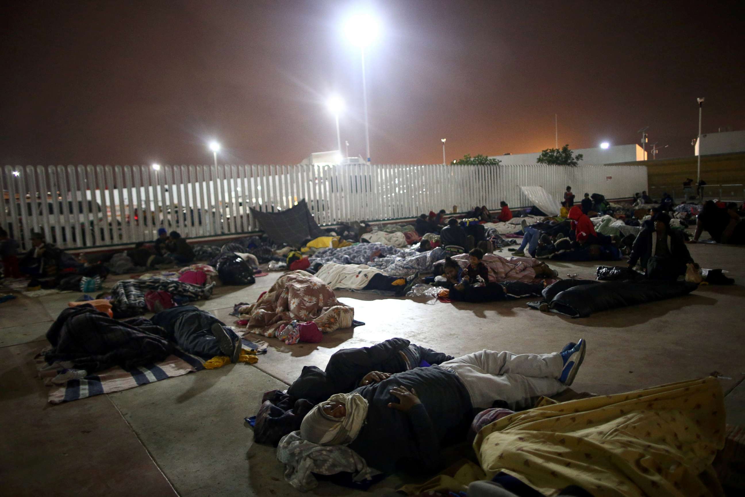 Members of a caravan of migrants from Central America sleep near the San Ysidro checkpoint after a small group of fellow migrants entered the U.S. border and customs facility, where they are expected to apply for asylum in Tijuana, Mexico, April 29, 2018.