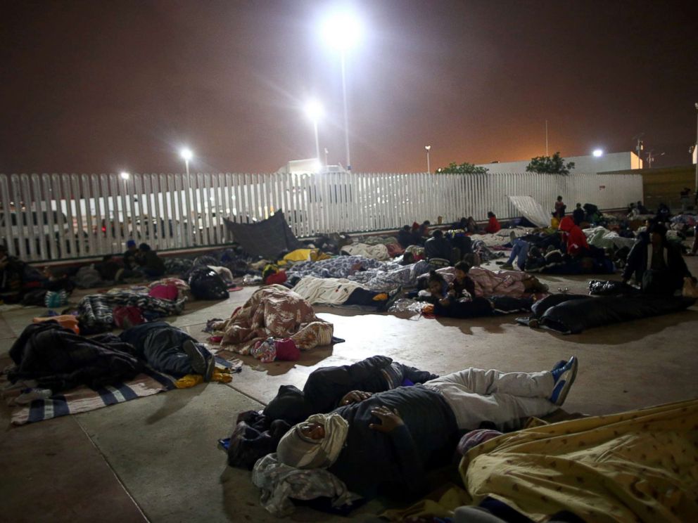 Members of a caravan of migrants from Central America sleep near the San Ysidro checkpoint after a small group of fellow migrants entered the U.S. border and customs facility, where they are expected to apply for asylum in Tijuana, Mexico, April 29, 2018.