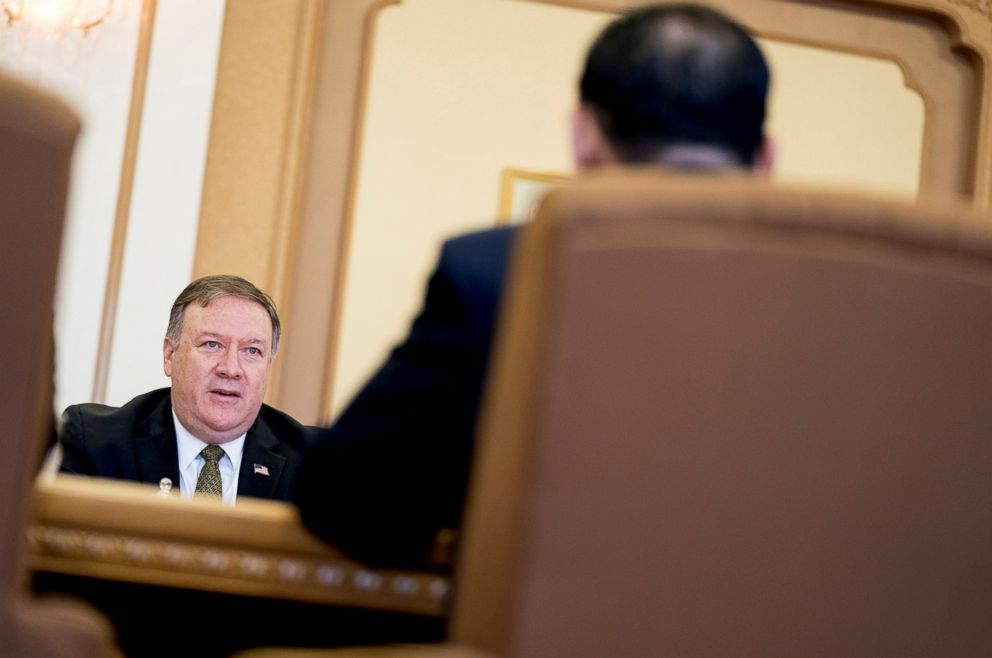 PHOTO: Secretary of State Mike Pompeo, left, speaks to Kim Yong Chol, foreground, a North Korean senior ruling party official and former intelligence chief, for a second day of talks at the Park Hwa Guest House in Pyongyang, North Korea, July 7, 2018.