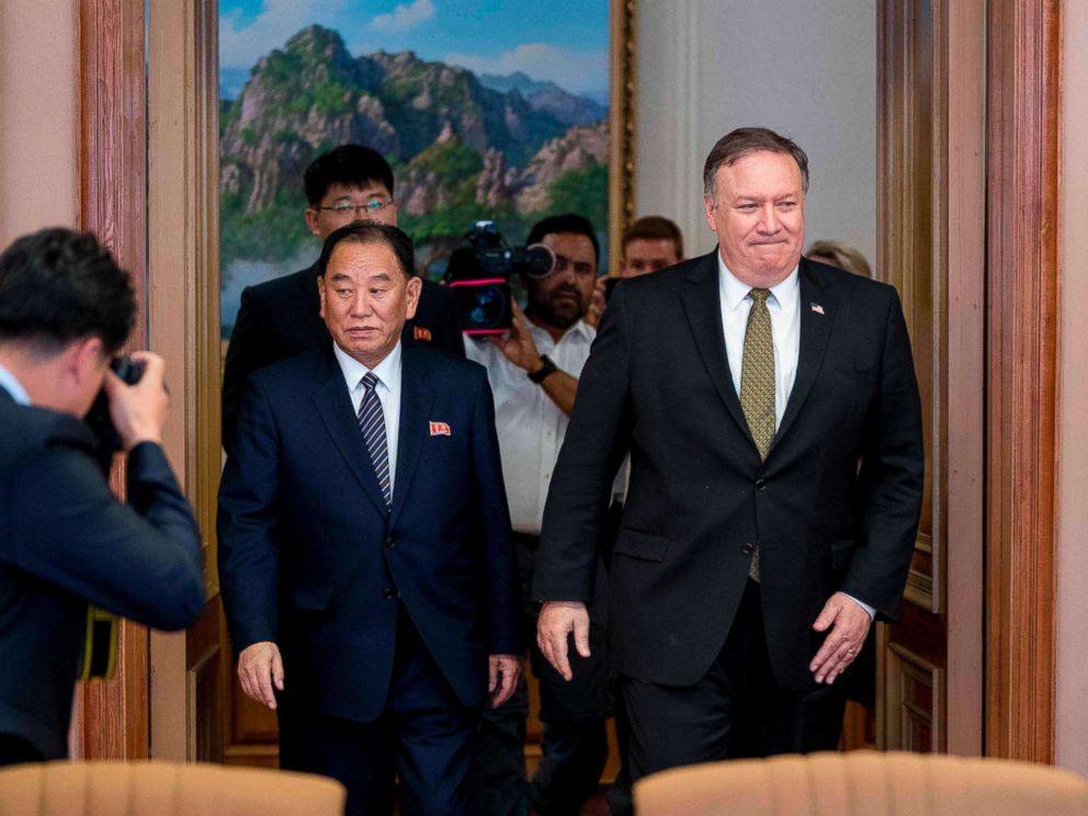 PHOTO: Secretary of State Mike Pompeo (R) and Kim Yong Chol (L), North Korean senior ruling party official and former intelligence chief, return to discussions after a break at Park Hwa Guest House in Pyongyang on July 7, 2018.