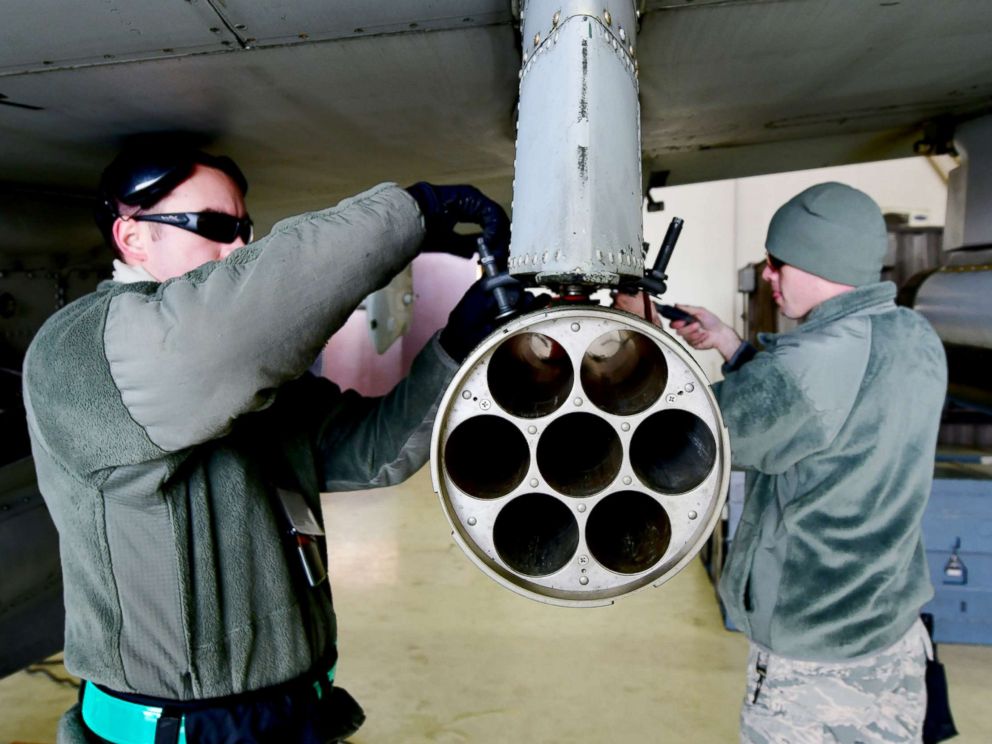 PHOTO: U.S. Air Force Senior Airmen Hamlin Burch and Jacob Wiemers remove a weapon system from an A-10 Thunderbolt II aircraft during exercise Vigilant Ace 18 at Osan Air Base, Republic of Korea, Dec. 2, 2017. 
