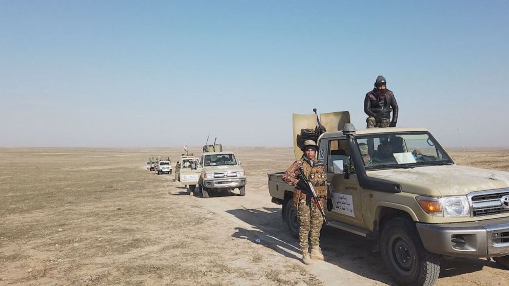 PHOTO: ABC News met with one Shia militia group heading across the desert, hunting down extremists with more than a hundred men.