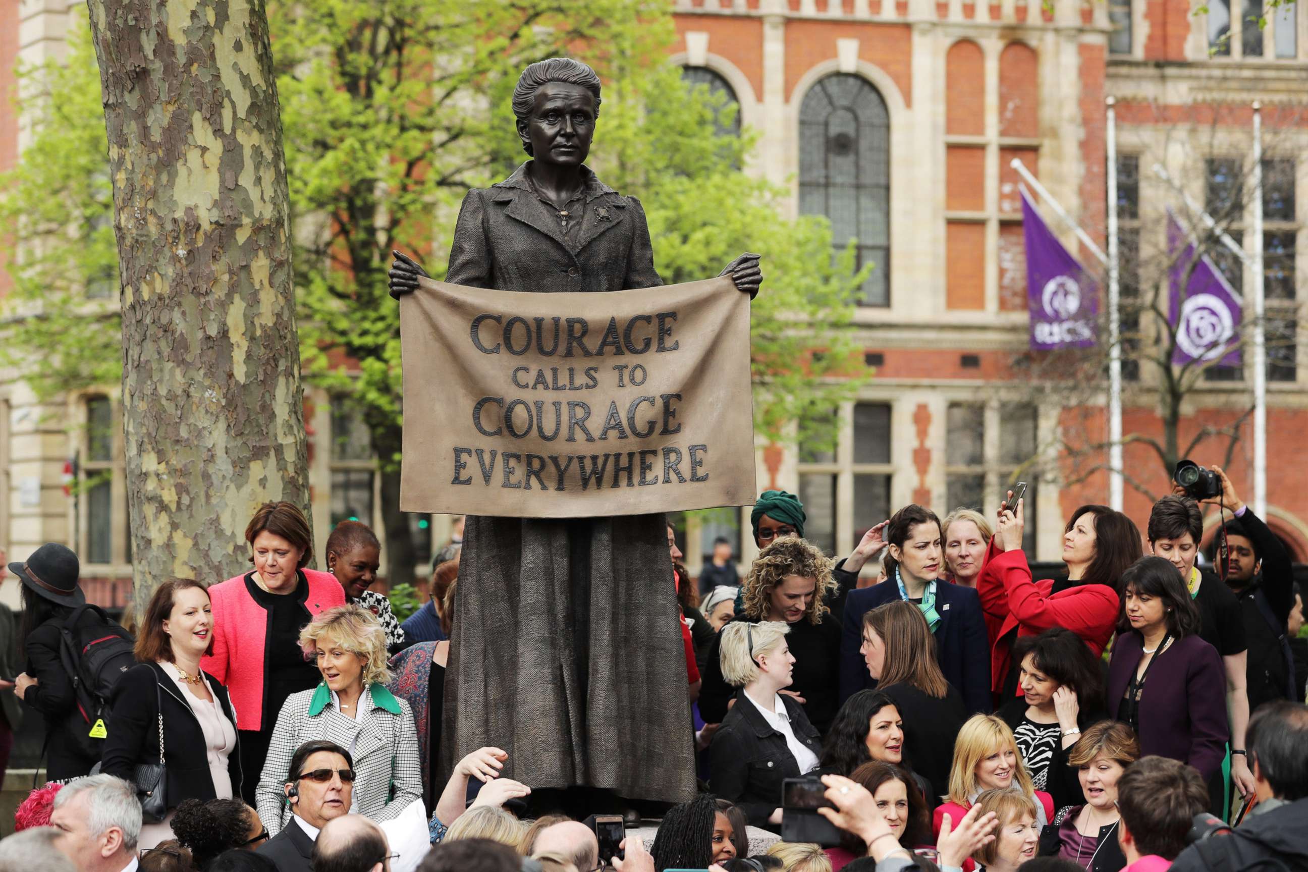 PHOTO: A statue in honor of the first female Suffragette Millicent Fawcett is unveiled during a ceremony in Parliament Square, April 24, 2018 in London.