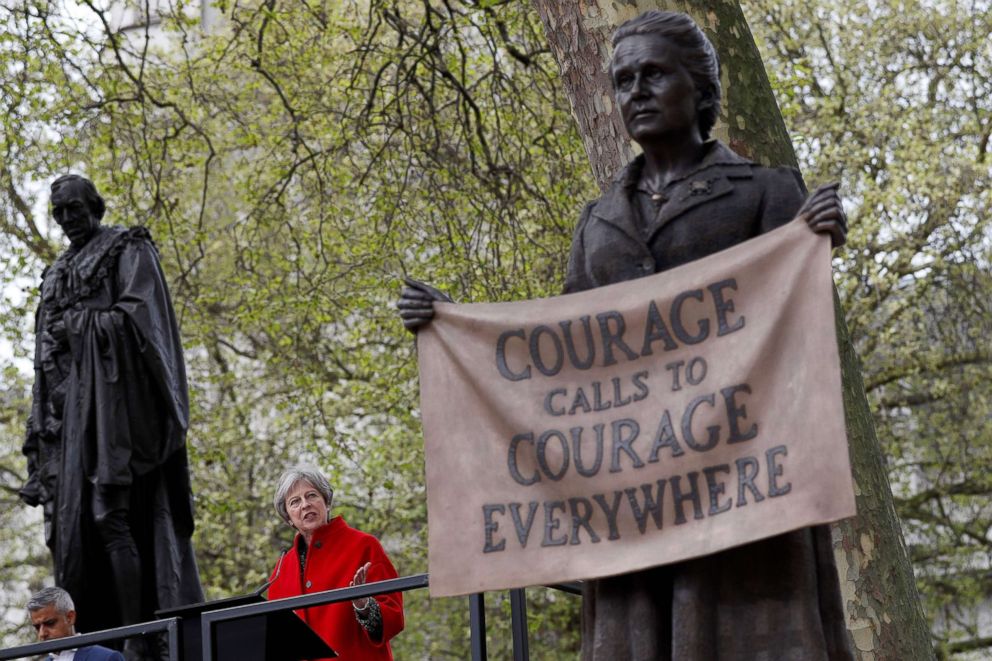 PHOTO: Prime Minister Theresa May speaks during the unveiling of a statue of suffragist and women's rights campaigner Millicent Fawcett, by British artist Gillian Wearing, in Parliament Square in London on April 24, 2018.
