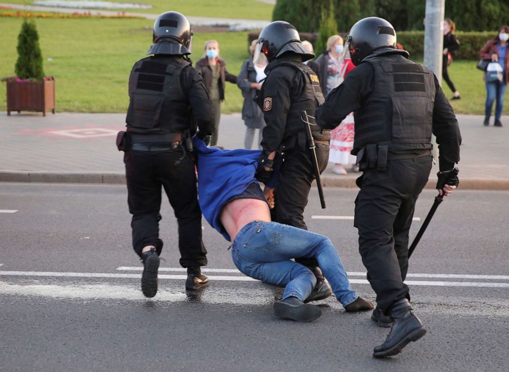 PHOTO: Belarusian law enforcement officers detain a man during an opposition protest against the inauguration of President Alexander Lukashenko in Minsk, Belarus, Sept. 23, 2020.