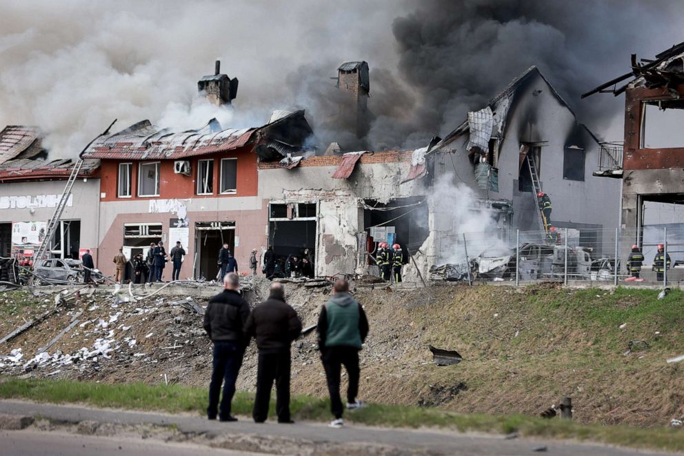 PHOTO: Firefighters battle a blaze after a civilian building was hit by a Russian missile in Lviv, western Ukraine, on April 18, 2022.