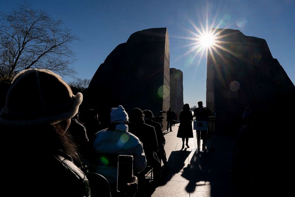 Martin Luther King III, right, the son of Martin Luther King Jr., accompanied by his wife Arndrea Waters King, left, speaks during a wreath-laying ceremony at the Martin Luther King Jr. Memorial on Martin Luther King Jr. Day in Washington, Jan. 16, 2023.