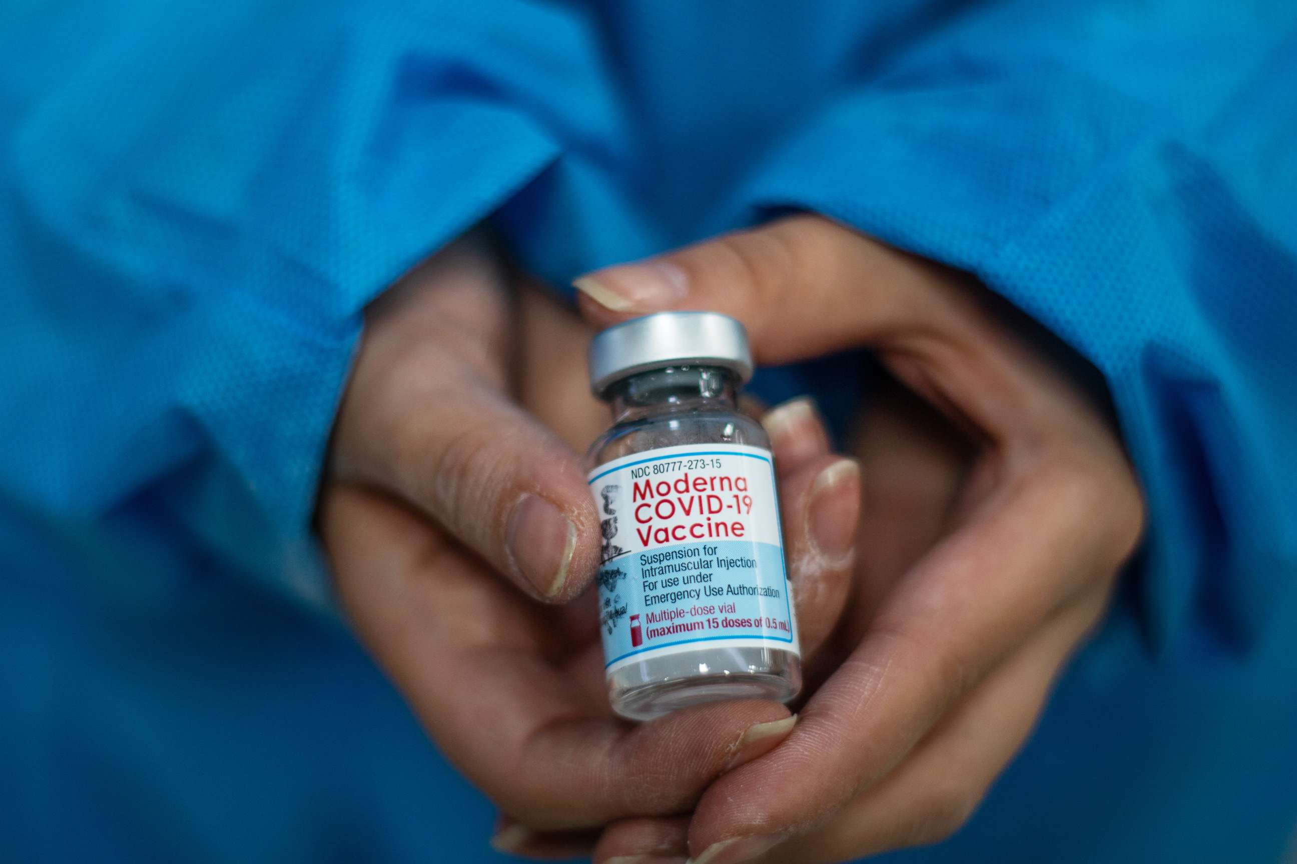 PHOTO: A nurse shows a vial of the Moderna Covid-19 vaccine.