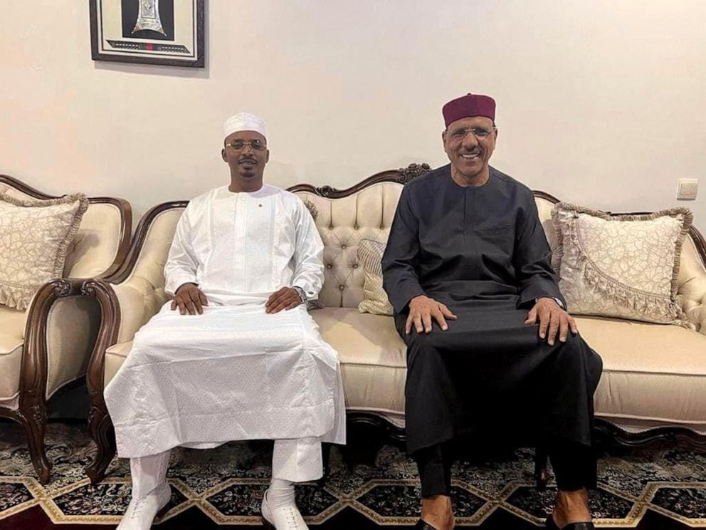 PHOTO: This image obtained from the Facebook page of the president of Chad, General Mahamat Idriss Deby Itno, shows him meeting with ousted Niger President Mohamed Bazoum in Niamey on July 30, 2023.