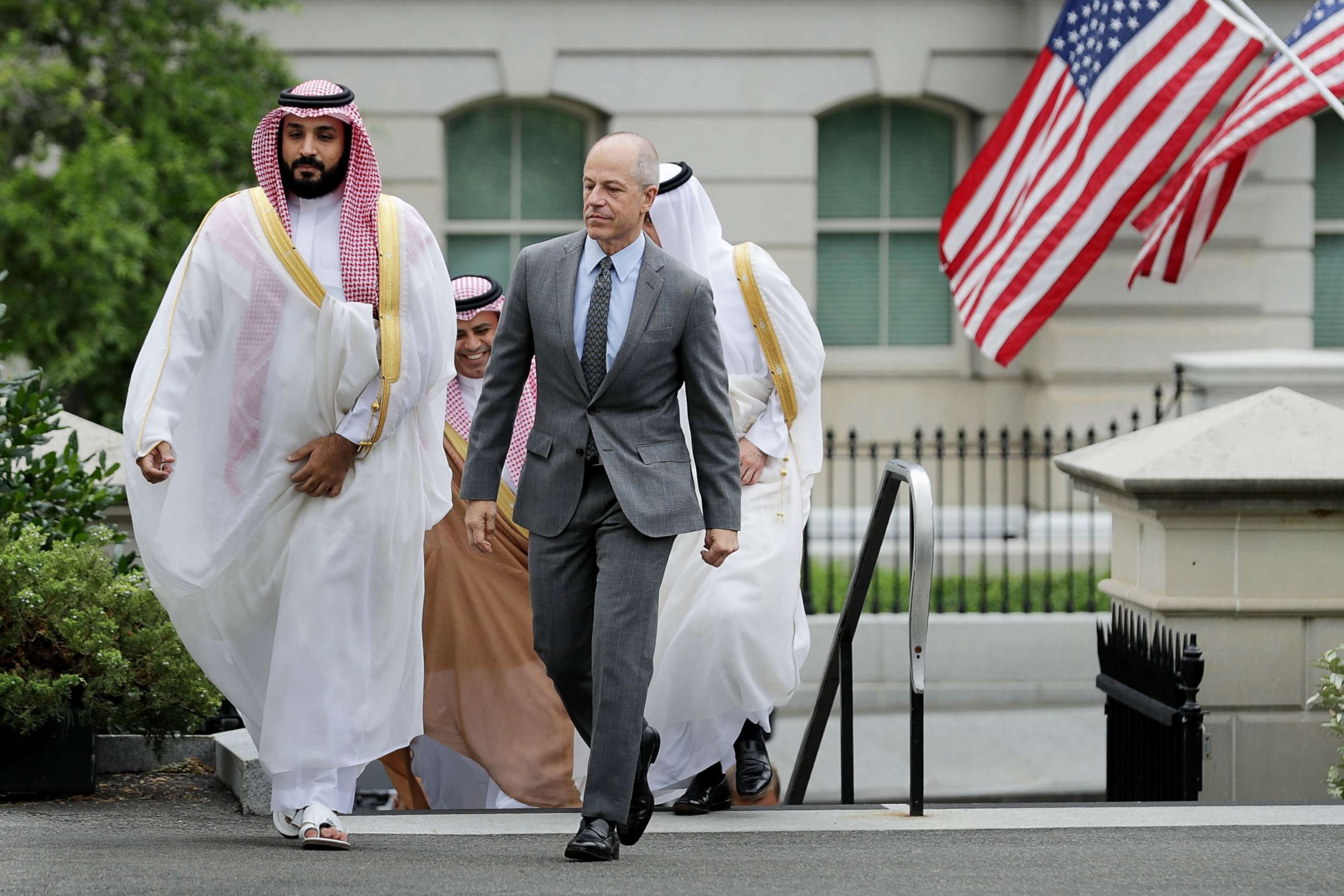 PHOTO: Deputy Crown Prince and Minister of Defense Mohammed bin Salman of Saudi Arabia  is escorted by U.S. Deputy Chief of Protocol Mark Walsh as they walk into in the White House on June 17, 2016 in Washington.