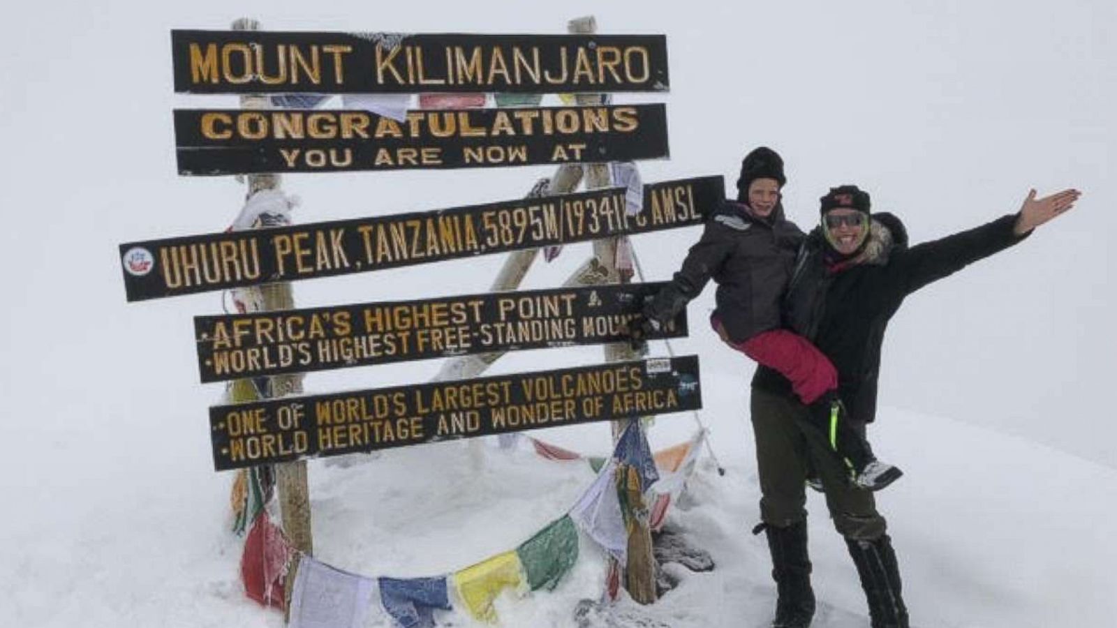 PHOTO: Hollie Kenney and her 7-year-old daughter, Montannah, pose at the summit of Mount Kilimanjaro.