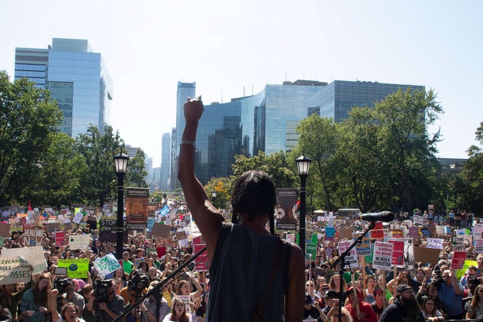 PHOTO: First Nations activist Caroline Crawley addresses the crowd as protesters gather outside the Ontario Legislature for the Climate Strike, in Toronto on Friday, Sept. 27, 2019.