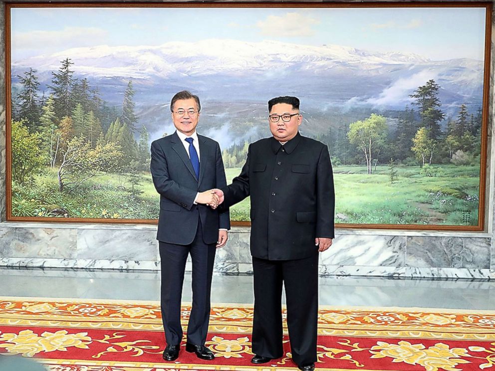 PHOTO: South Korean President Moon Jae-in (L) shakes hands with North Korean leader Kim Jong Un (R) before their meeting on May 26, 2018 in Panmunjom, North Korea, May 26, 2018.