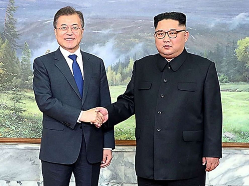 PHOTO: South Korean President Moon Jae-in (L) shakes hands with North Korean leader Kim Jong Un (R) before their meeting on May 26, 2018 in Panmunjom, North Korea, May 26, 2018.