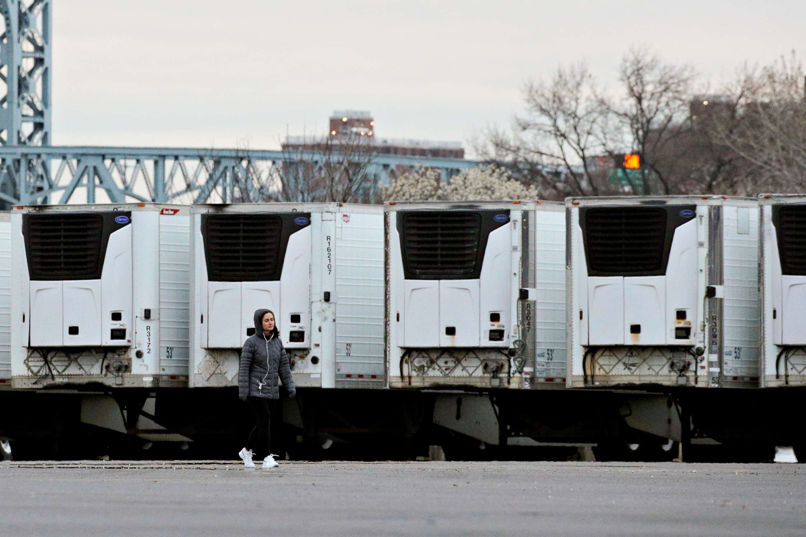 PHOTO: Refrigerated tractor trailers that can be used by hospitals as makeshift morgues are seen in Icahn Stadium parking lot on Randall's Island, in New York City, March 31, 2020.