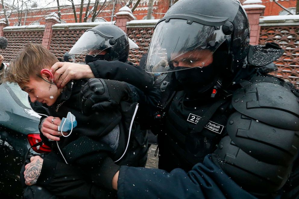 PHOTO: In this Sunday, Jan. 31, 2021 file photo, police officers detain a young demonstrator during a protest near the Matrosskaya Tishina prison where Alexei Navalny is being held, in Moscow.