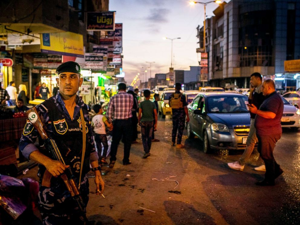 PHOTO: Security forces patrol outside the busy Prophet Younis market in East Mosul on Nov. 5, 2017.