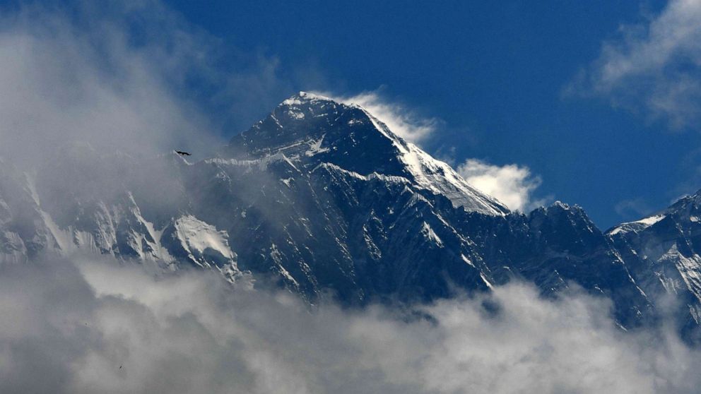PHOTO: In this May 27, 2019, file photo, Mount Everest appears amidst the clouds.