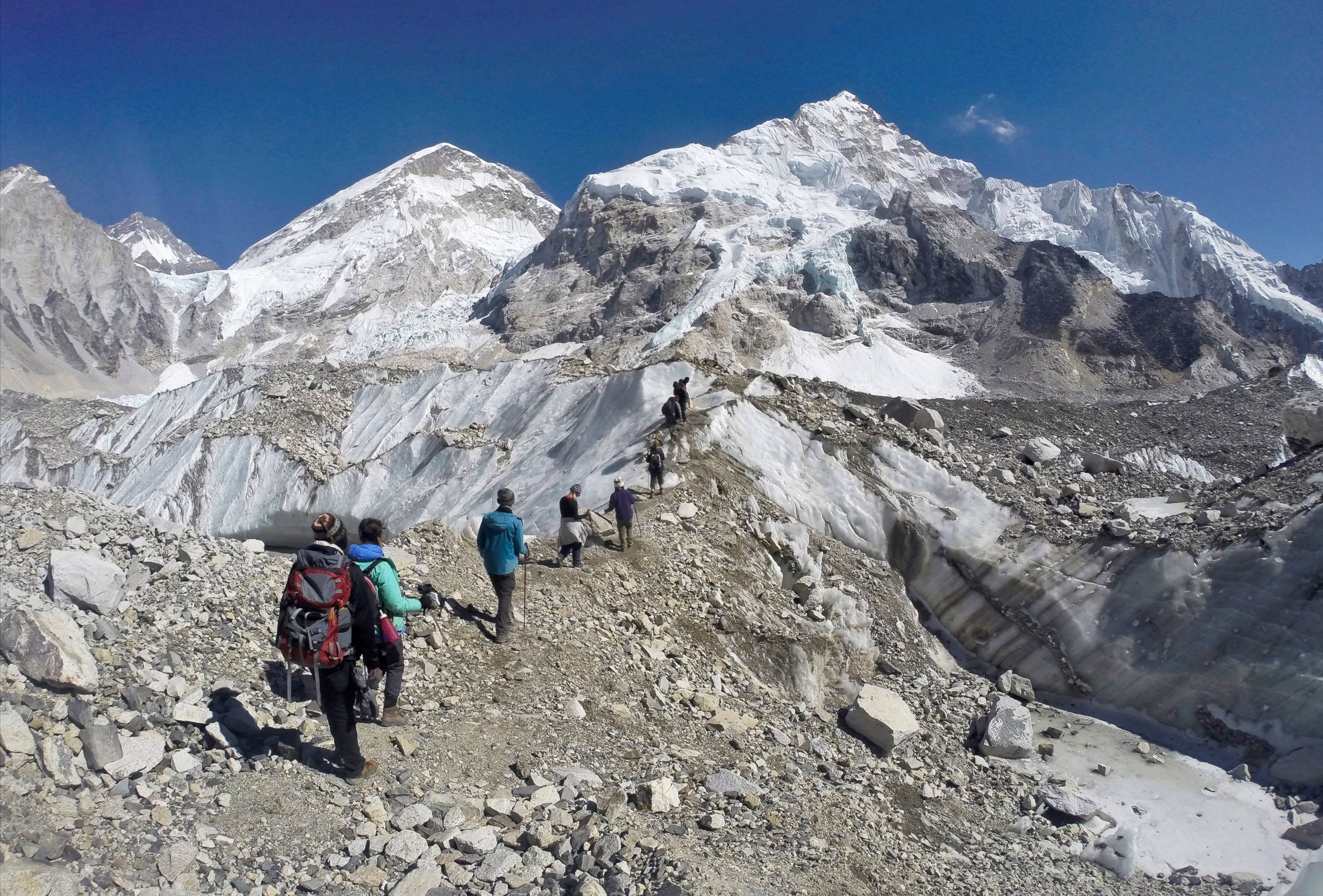 PHOTO: In this Monday, Feb. 22, 2016 file photo, trekkers pass through a glacier at the Mount Everest base camp, Nepal.