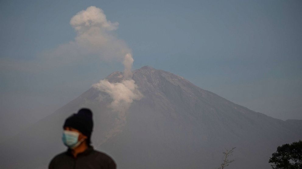 PHOTO: Smoke rises from Mount Semeru, Dec. 5, 2022, in Lumajang Regency, Indonesia.