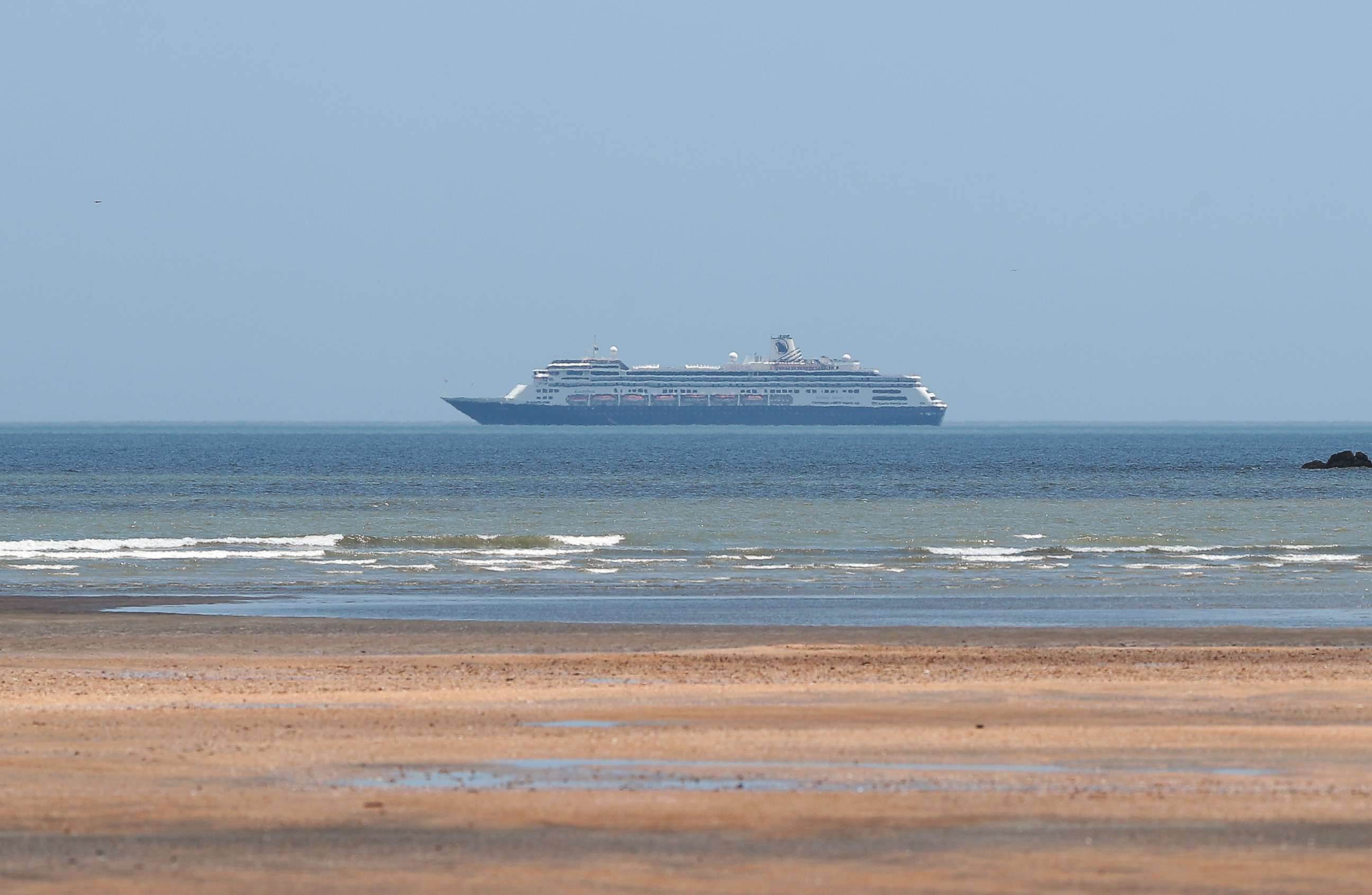 PHOTO: The Holland America Line cruise ship MS Zaandam is pictured, where passengers have died onboard, as the coronavirus disease (COVID-19) outbreak continues, in Panama City, Panama March 28, 2020. REUTERS/Erick Marciscano/File Photo