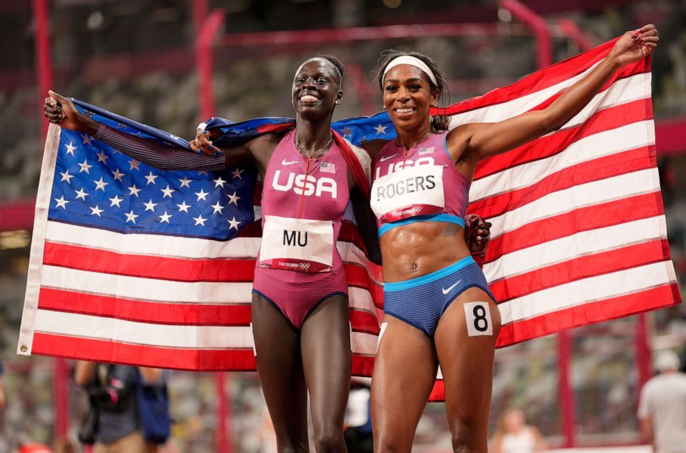 PHOTO: Athing Mu, of United States celebrates winning the gold medal with Raevyn Rogers who won the bronze after the final of the women's 800-meters at the 2020 Summer Olympics, Aug. 3, 2021, in Tokyo, Japan.
