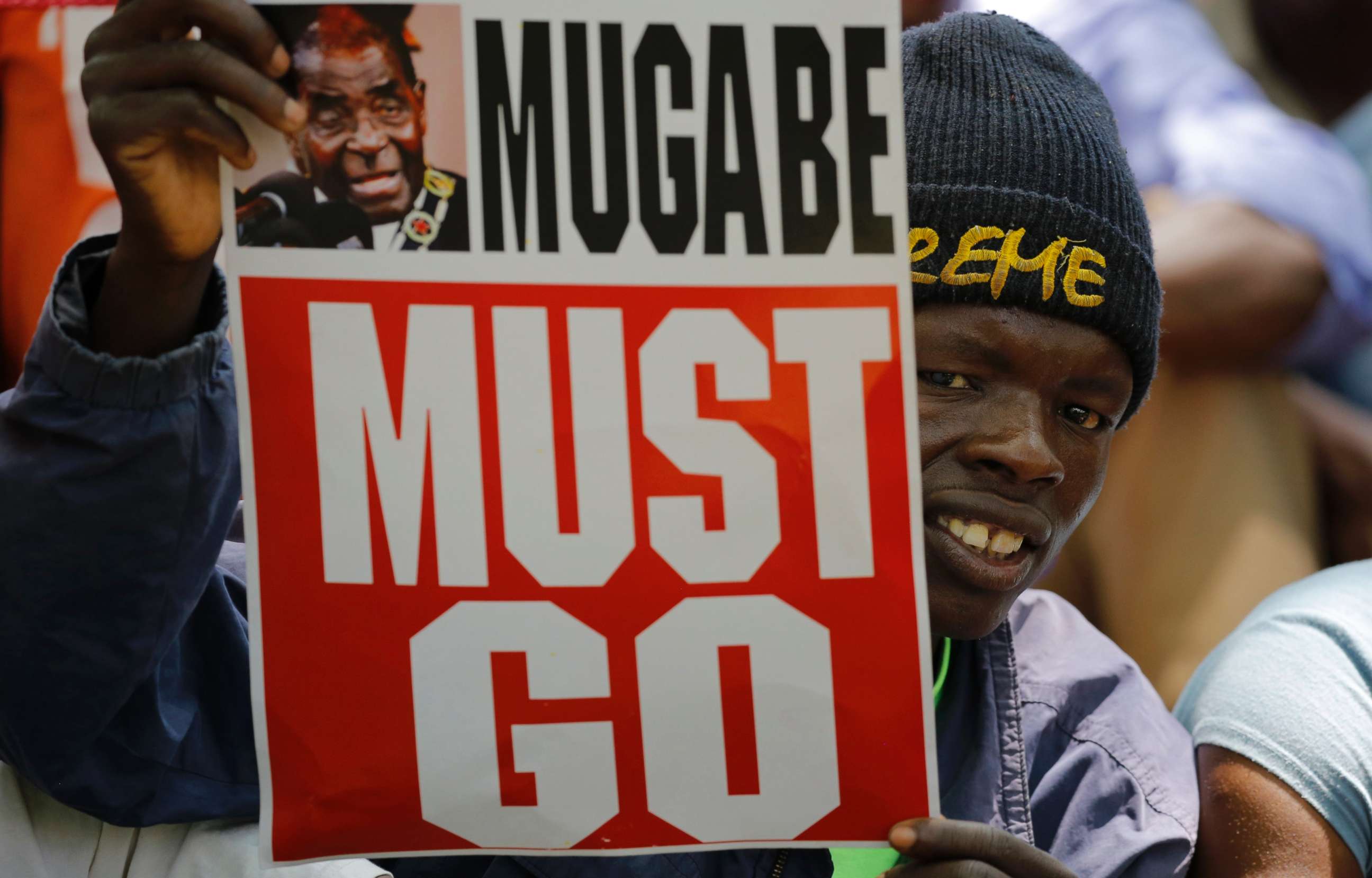 PHOTO: People gather at an opposition party rally outside the state parliament in before the proposed impeachment of president Robert Mugabe, Harare, Zimbabwe, Nov. 21, 2017.