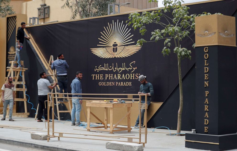 PHOTO: Workers prepare for the transfer of 22 mummies from the Egyptian Museum in Tahrir Square to the National Museum of Egyptian Civilization in Fustat in Cairo on April 1, 2021.