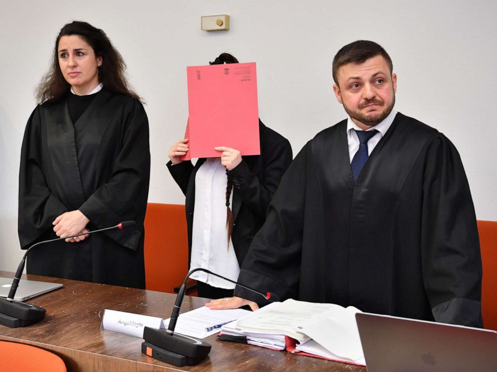 PHOTO:Jennifer W. stands in between her lawyers Ali Aydin and Seda Basay-Yildiz at the first day of her trial at the Oberlandesgericht courthouse, April 9, 2019, in Munich.
