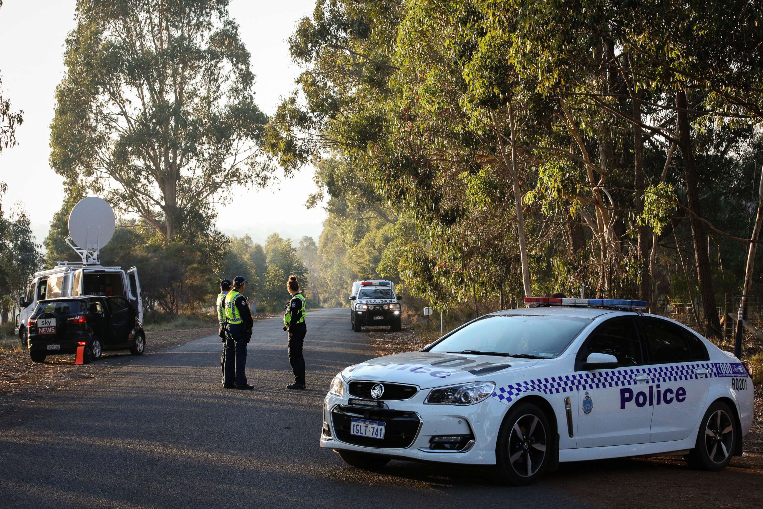 PHOTO: Police block a road during an investigation at a rural property in Osmington, Western Australia, Australia, May 12, 2018. Police are investigating the deaths of seven people in a suspected murder-suicide that took place on the property.