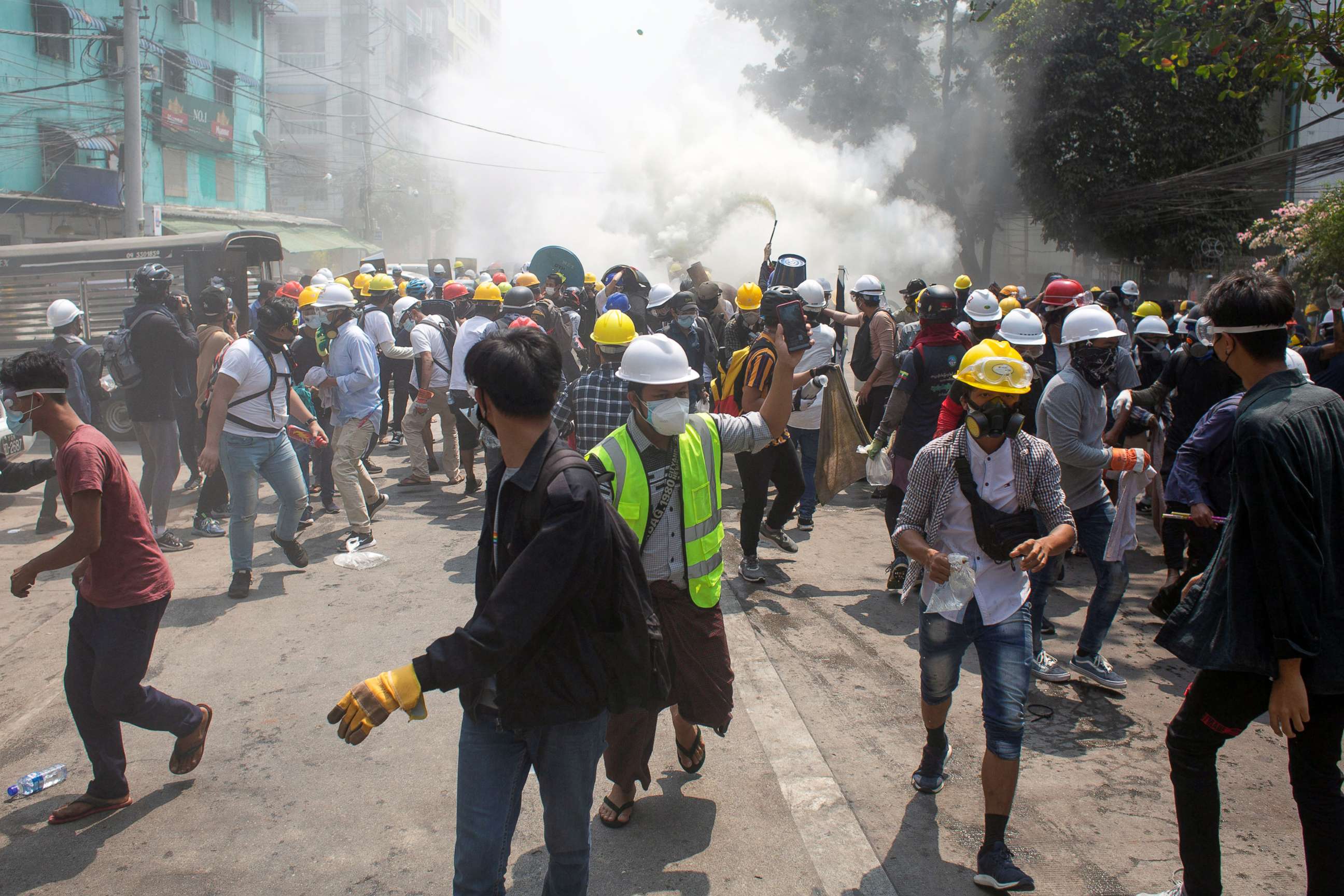 PHOTO: Protesters are seen near a barricade during a protest in Yangon, Myanmar, March 3, 2021.