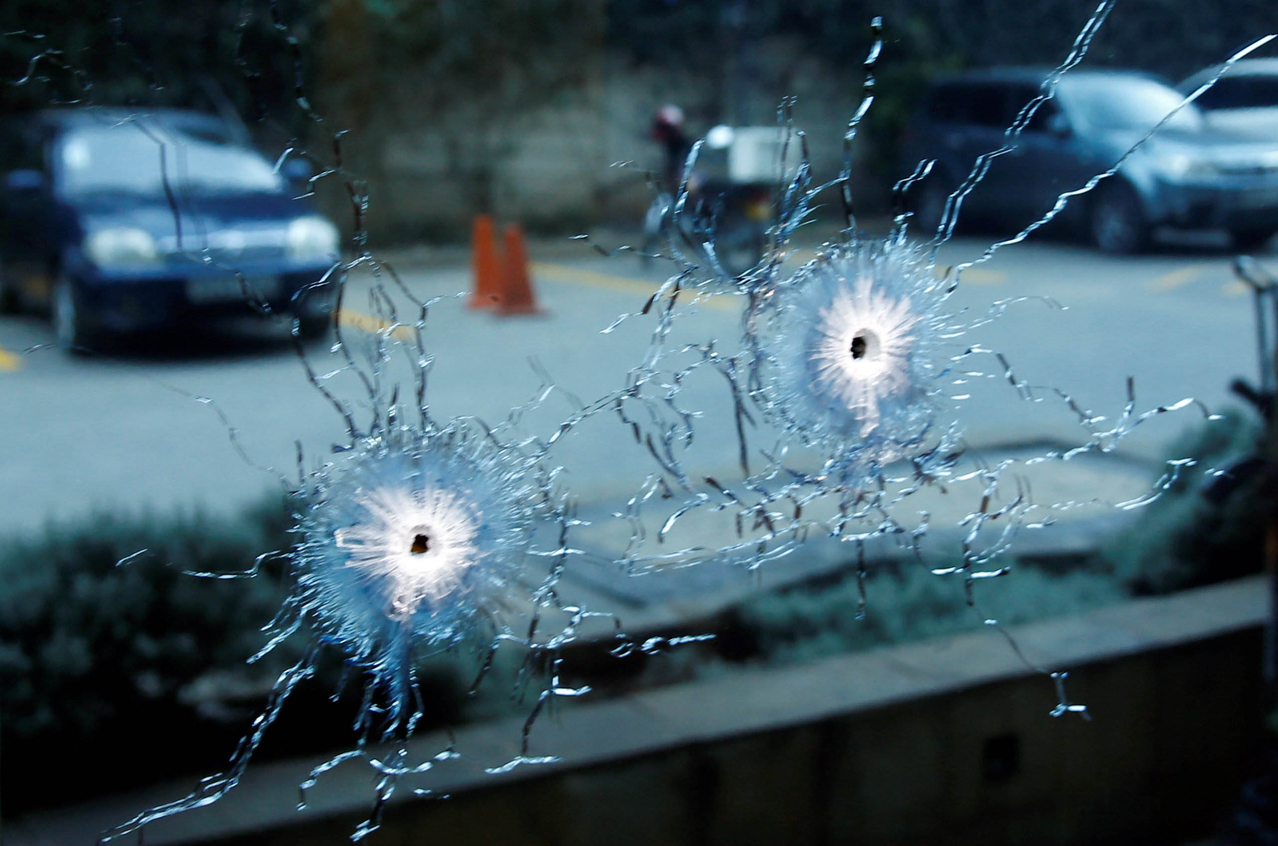 PHOTO: A glass damaged by bullets is seen at the scene where explosions and gunshots were heard at the Dusit hotel compound, in Nairobi, Kenya, Jan. 15, 2019.