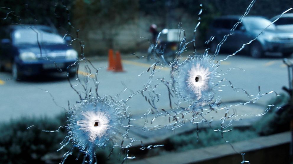 PHOTO: A glass damaged by bullets is seen at the scene where explosions and gunshots were heard at the Dusit hotel compound, in Nairobi, Kenya, Jan. 15, 2019.