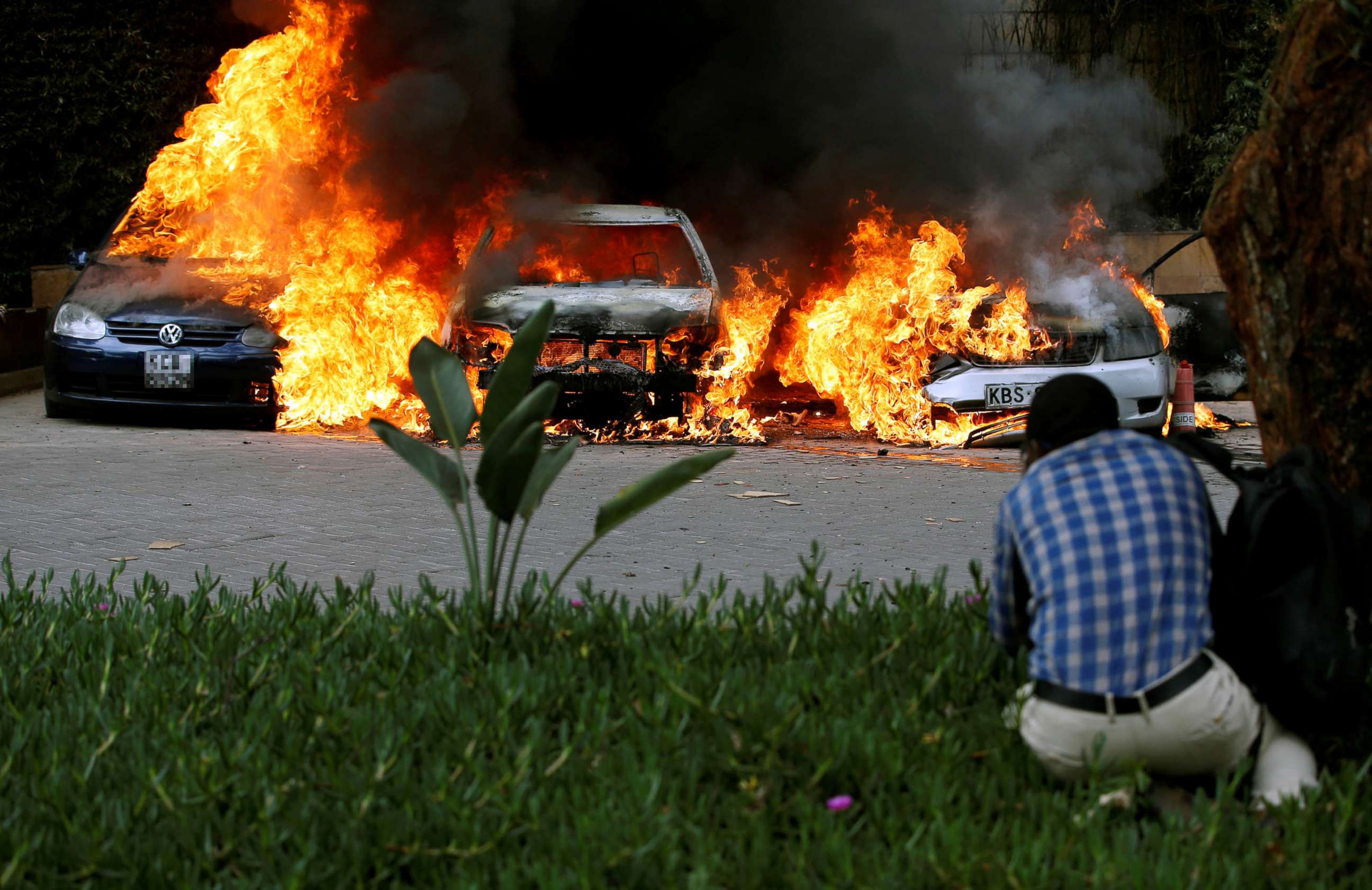 PHOTO: Cars are seen on fire at the scene of explosions and gunshots in Nairobi, Kenya, Jan. 15, 2019.