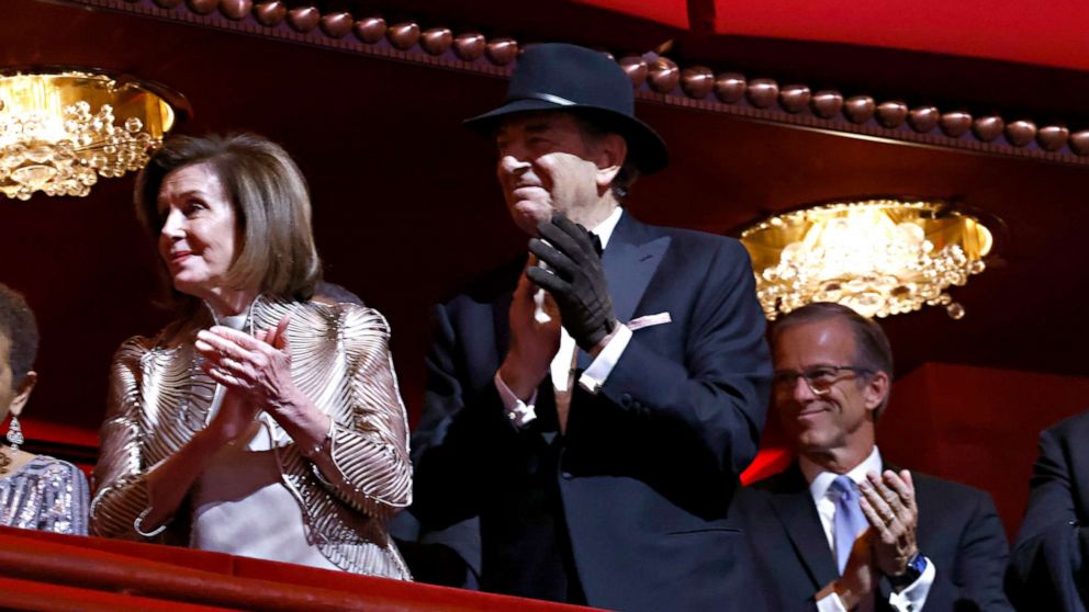 Pelosi wore a hat and a single glove at the Kennedy Center Honors in Washington.