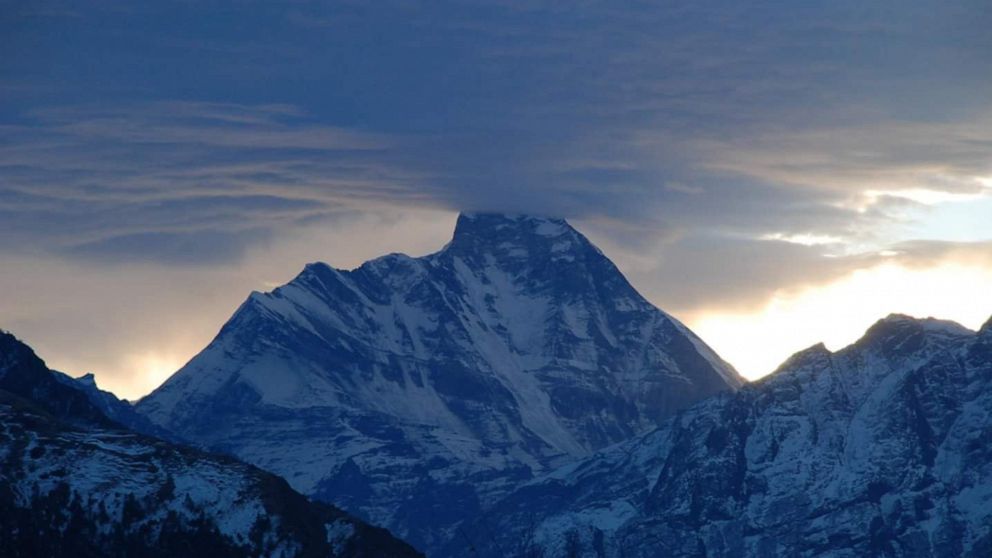 During a helicopter search for eight climbers missing in the Indian Himalayas, five bodies were reportedly spotted.