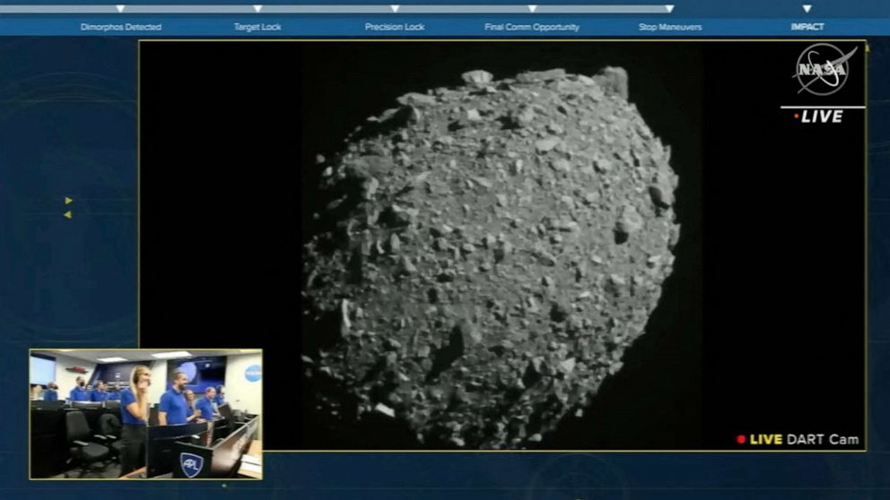 PHOTO: This screengrab made from NASA live feed shows Dimorphos just before the Double Asteroid Redirection Test (DART) made impact with the asteroid, as watched by the NASA team (bottom L) at DART headquarters in Laurel, Md., Sept. 26, 2022.