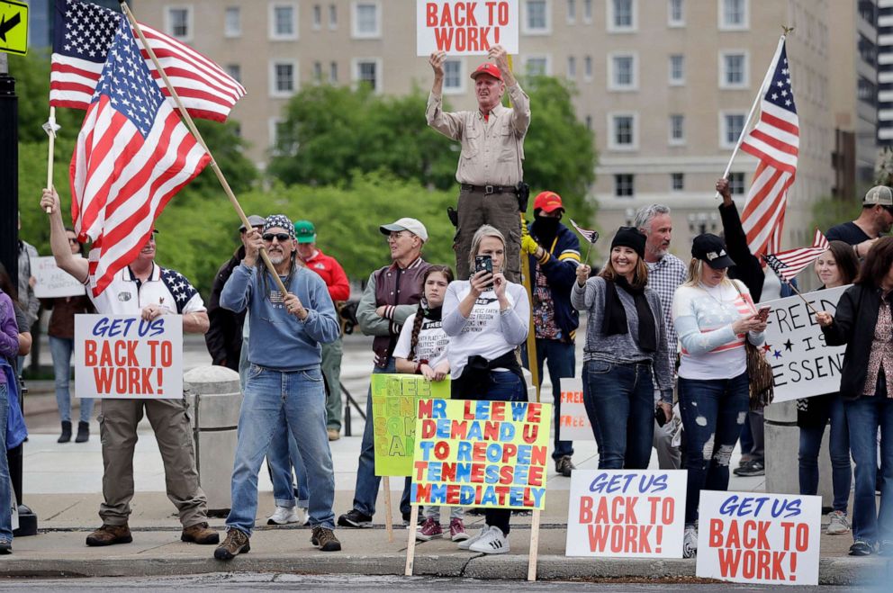 PHOTO: Protesters rally at the Tennessee state capitol to speak out against the state's handling of the COVID-19 outbreak, April 19, 2020, in Nashville, Tenn. 