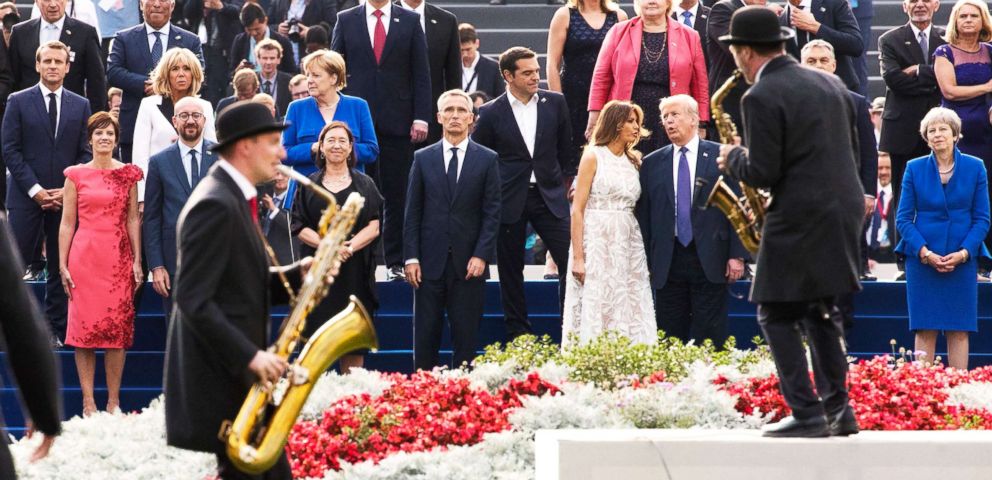 PHOTO: Dignitaries watch a show fter a dinner at the Parc du Cinquantenaire - Jubelpark park in Brussels, July 11, 2018.