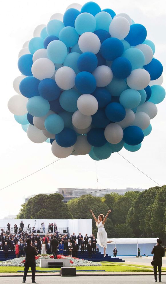 PHOTO: Participants of a NATO Summit attend a show after a dinner at the Parc du Cinquantenaire during the NATO Summit in Brussels, July 11, 2018.