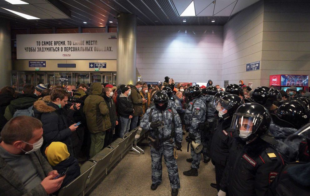 PHOTO: In this handout photo, law enforcement officers stand guard before the expected arrival of Russian opposition leader Alexei Navalny on a flight from the German capital Berlin at Vnukovo International Airport in Moscow, Jan. 17, 2021.