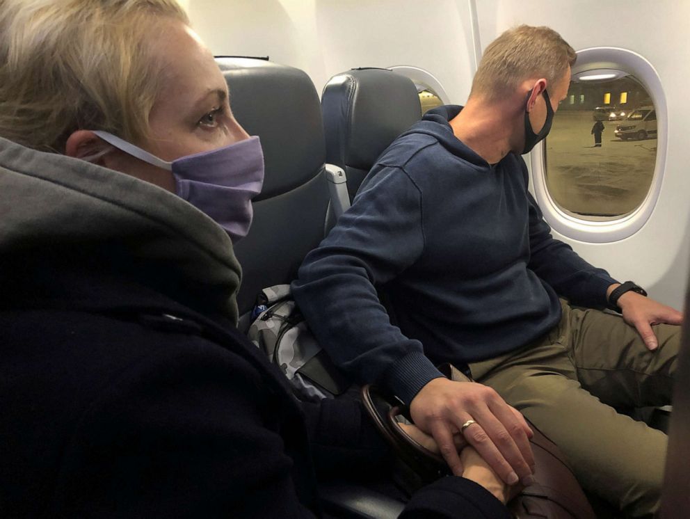 PHOTO: Russian opposition leader Alexei Navalny and his wife Yulia Navalnaya are seen on board a plane after landing at Sheremetyevo airport in Moscow, Jan. 17, 2021.