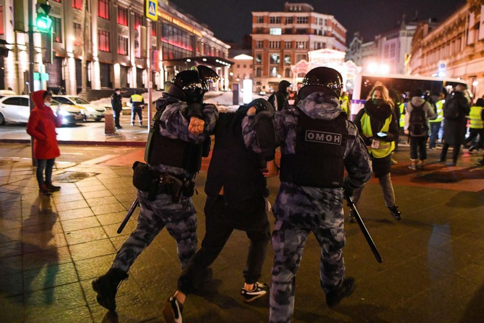 PHOTO: Riot police officers detain a man during a protest against a court ruling ordered Russian opposition leader Alexei Navalny jailed for nearly three years, in downtown Moscow early on Feb. 3, 2021.