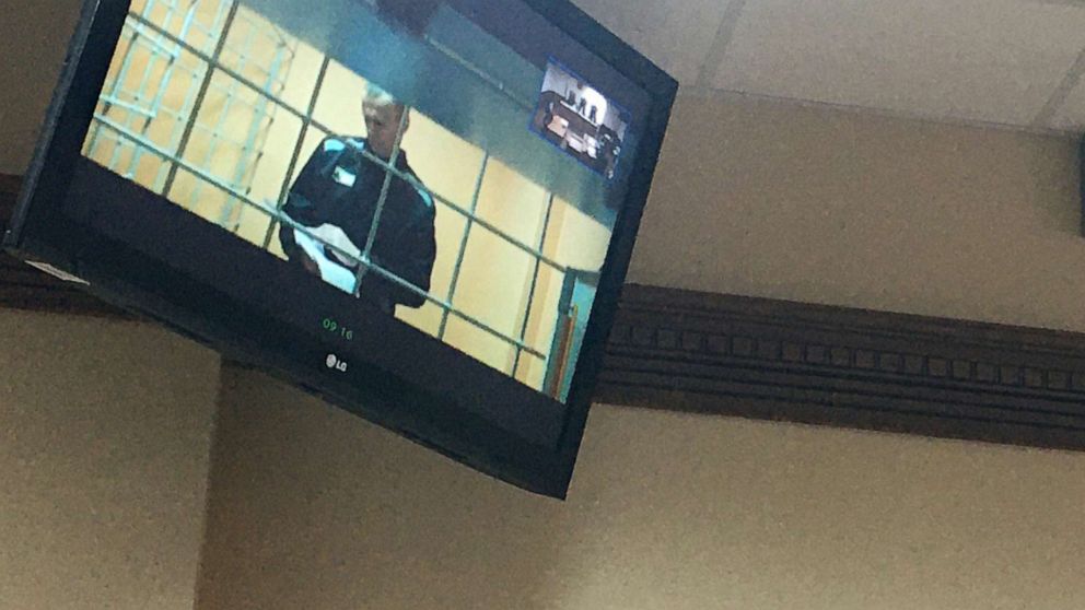 PHOTO: Jailed opposition activist Alexei Navalny is pictured on a video screen in the Vladimir Region Court as he joins a hearing into his appeal against a ruling by the Petushki District Court, on Sept. 23, 2021.